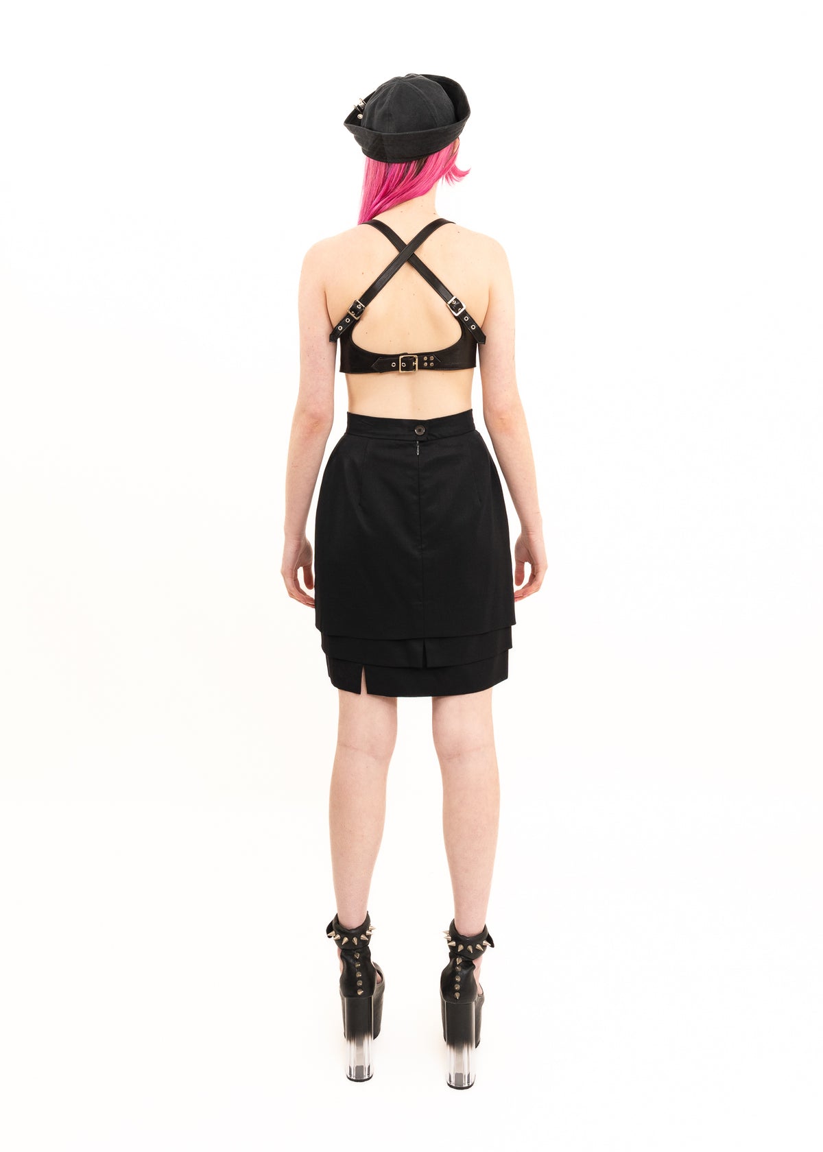 Pencil skirt with asymmetric layered hem