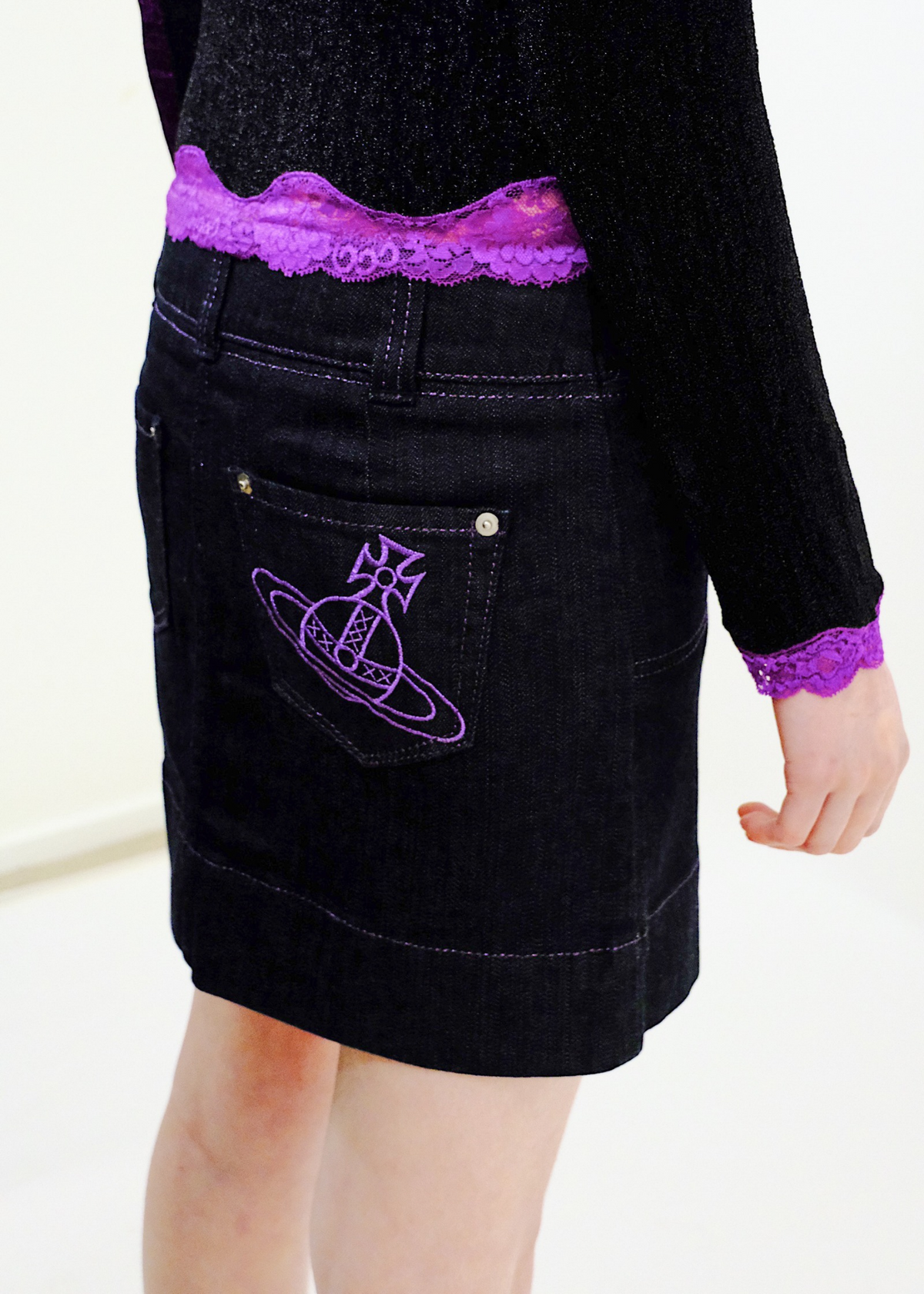 Orb embroidered denim mini skirt