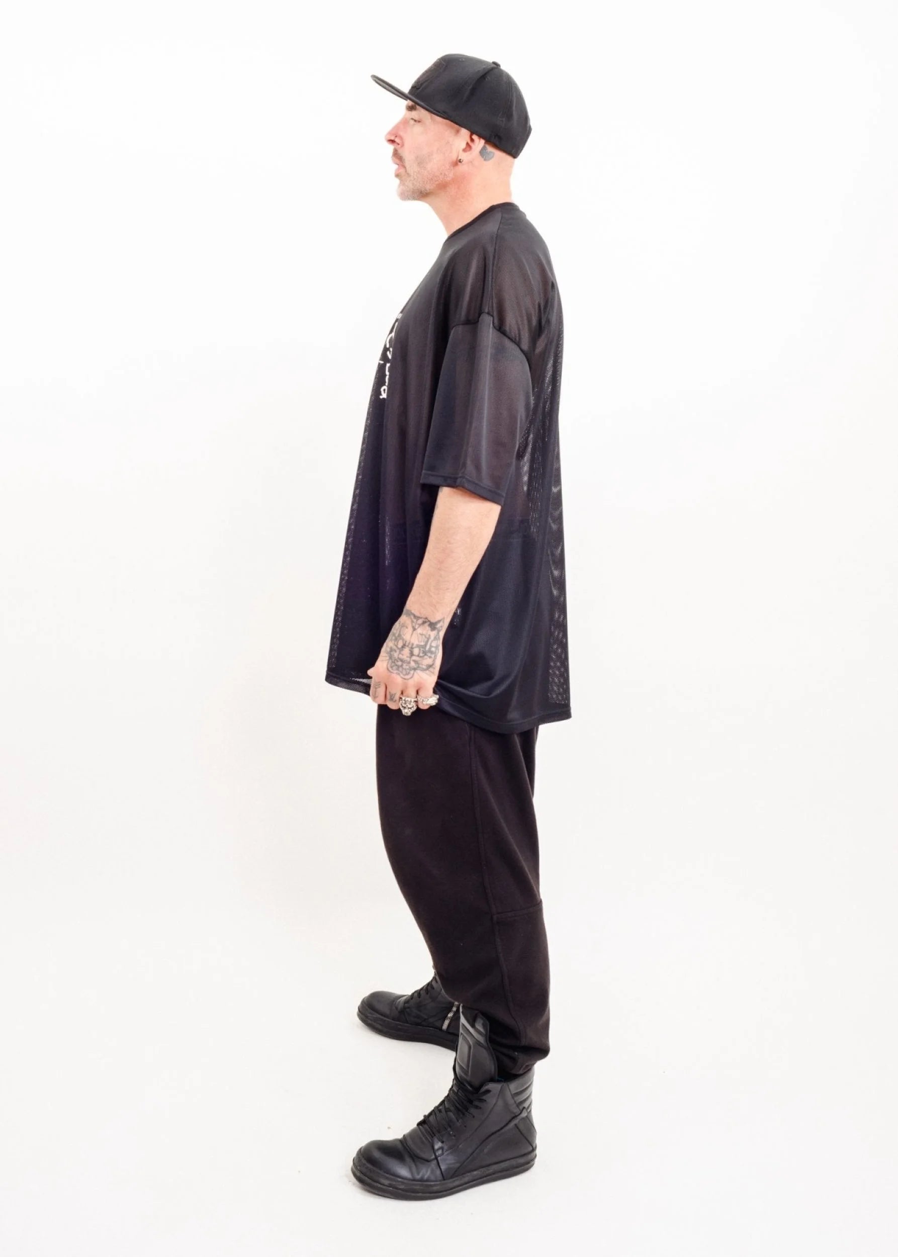Clark Dean “Eat Shit and Die” oversized mesh t-shirt