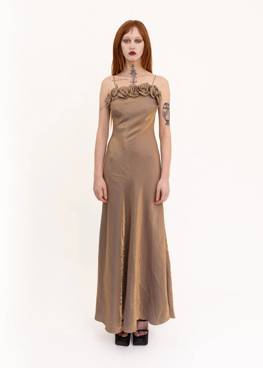 Charm’elle Paris Iridescent satin slip dress with rosette trim