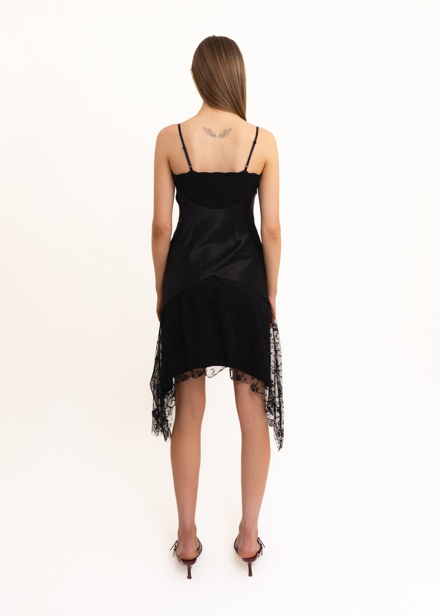 Silk beaded dress with handkerchief hem