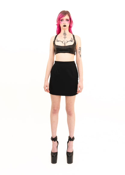 Mini skirt with lace insert and strap detail
