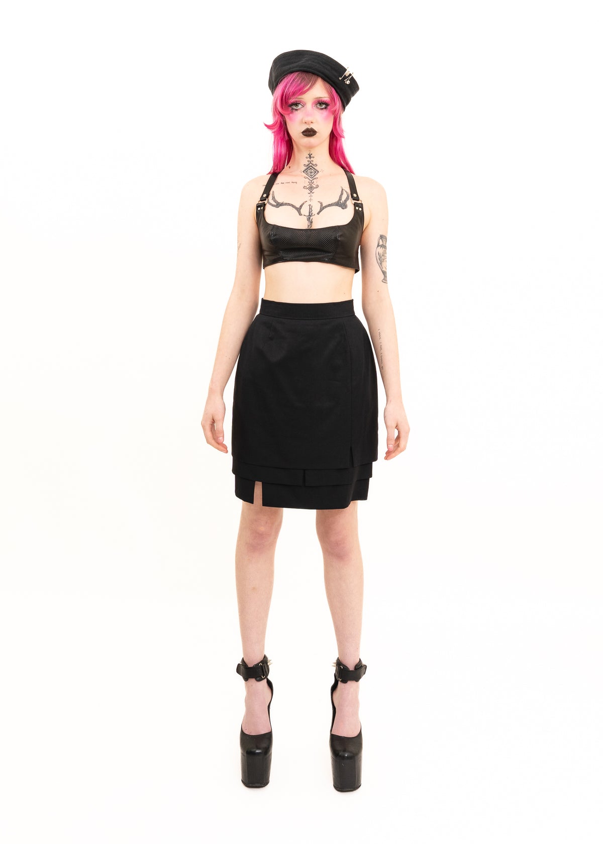 Pencil skirt with asymmetric layered hem