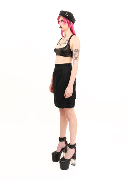 Pencil skirt with asymmetric layered hem