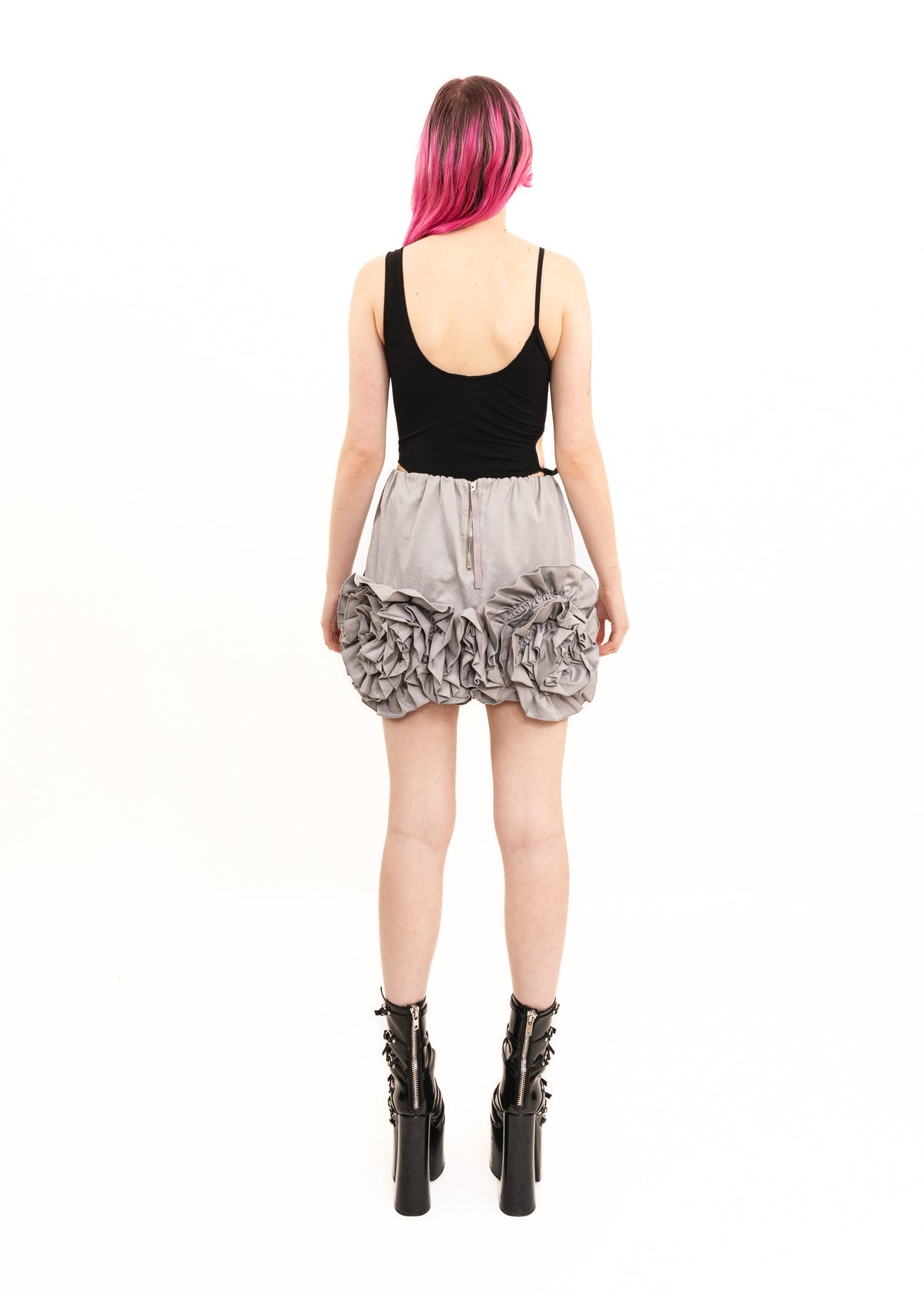 Rosette ruffle hem mini skirt