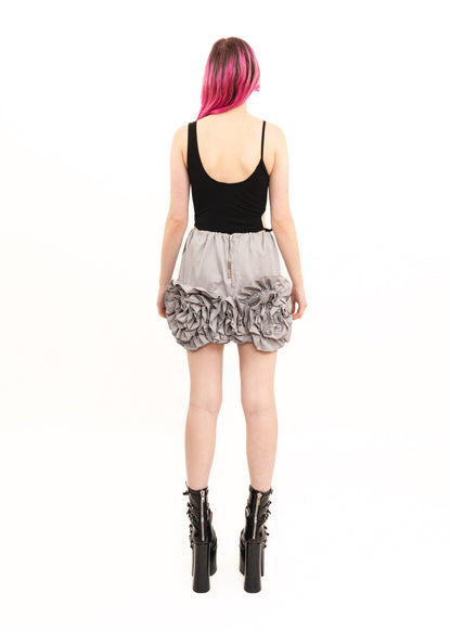 Rosette ruffle hem mini skirt
