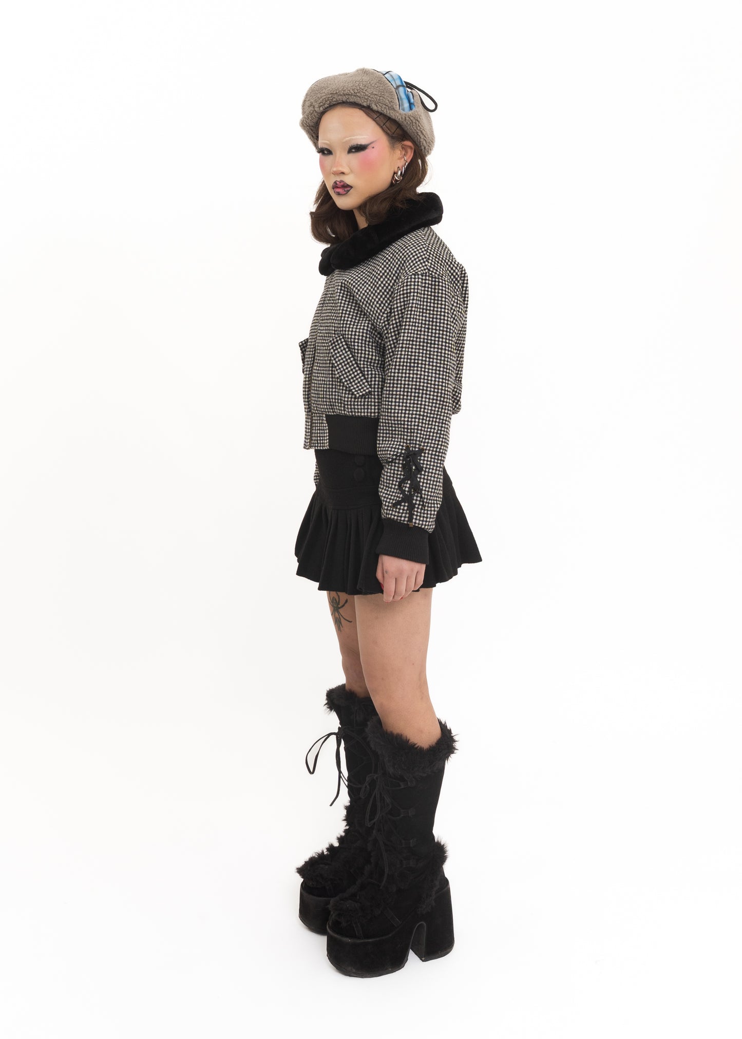 Gingham bomber jacket with lace up sleeves and faux fur collar