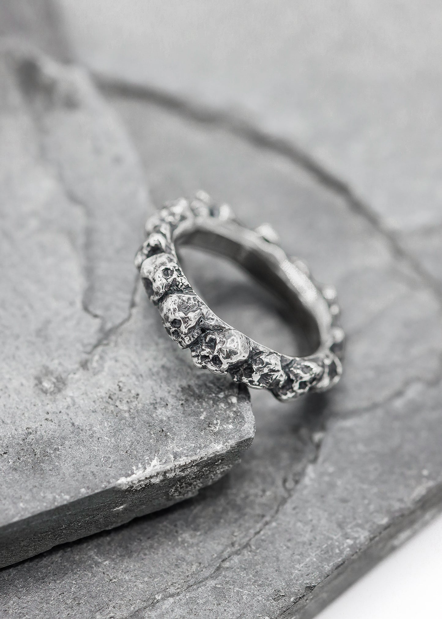 Mini band of skulls ring