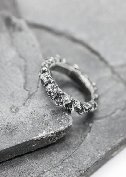 Mini band of skulls ring