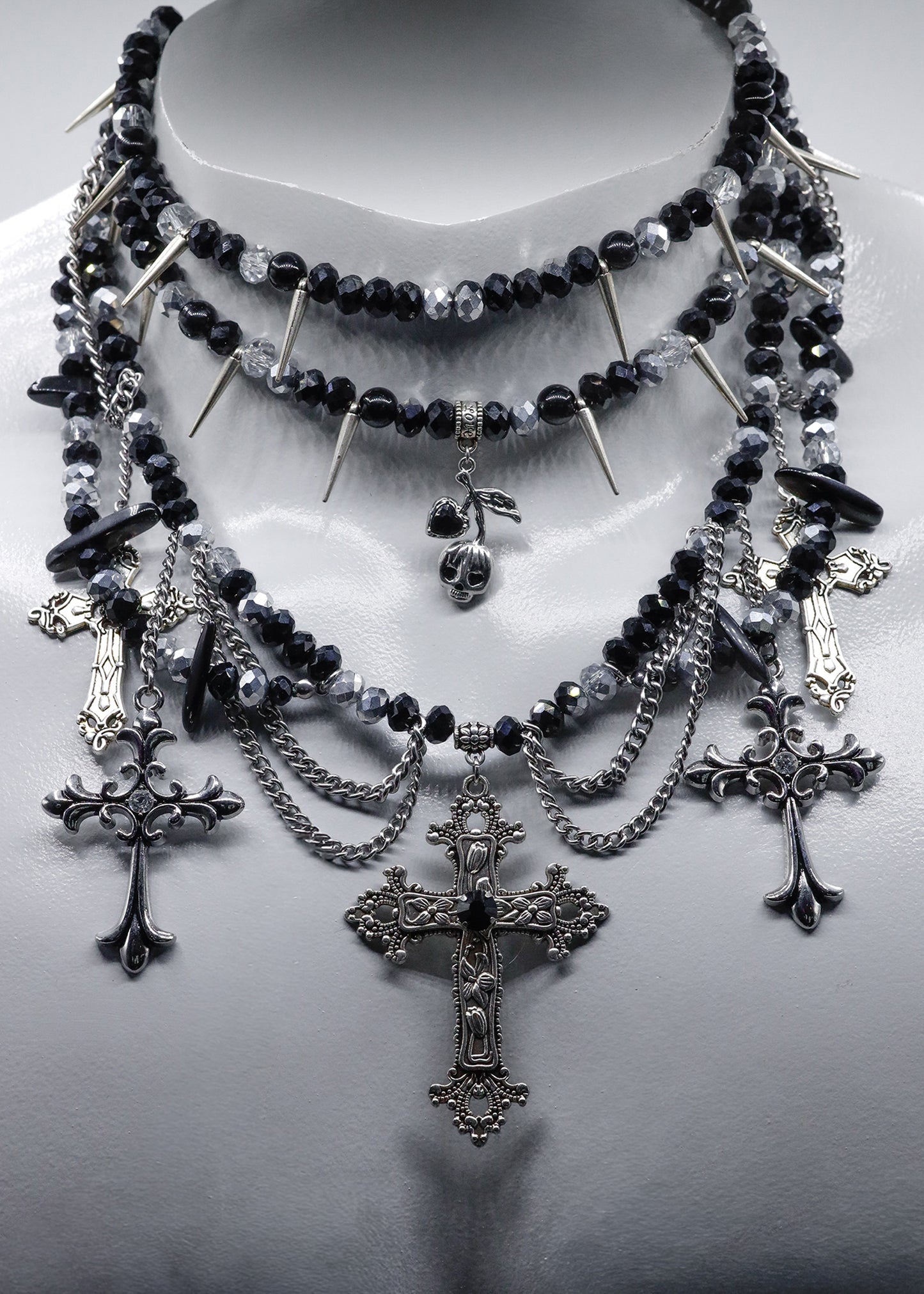 Multi strand beaded crucifix necklace