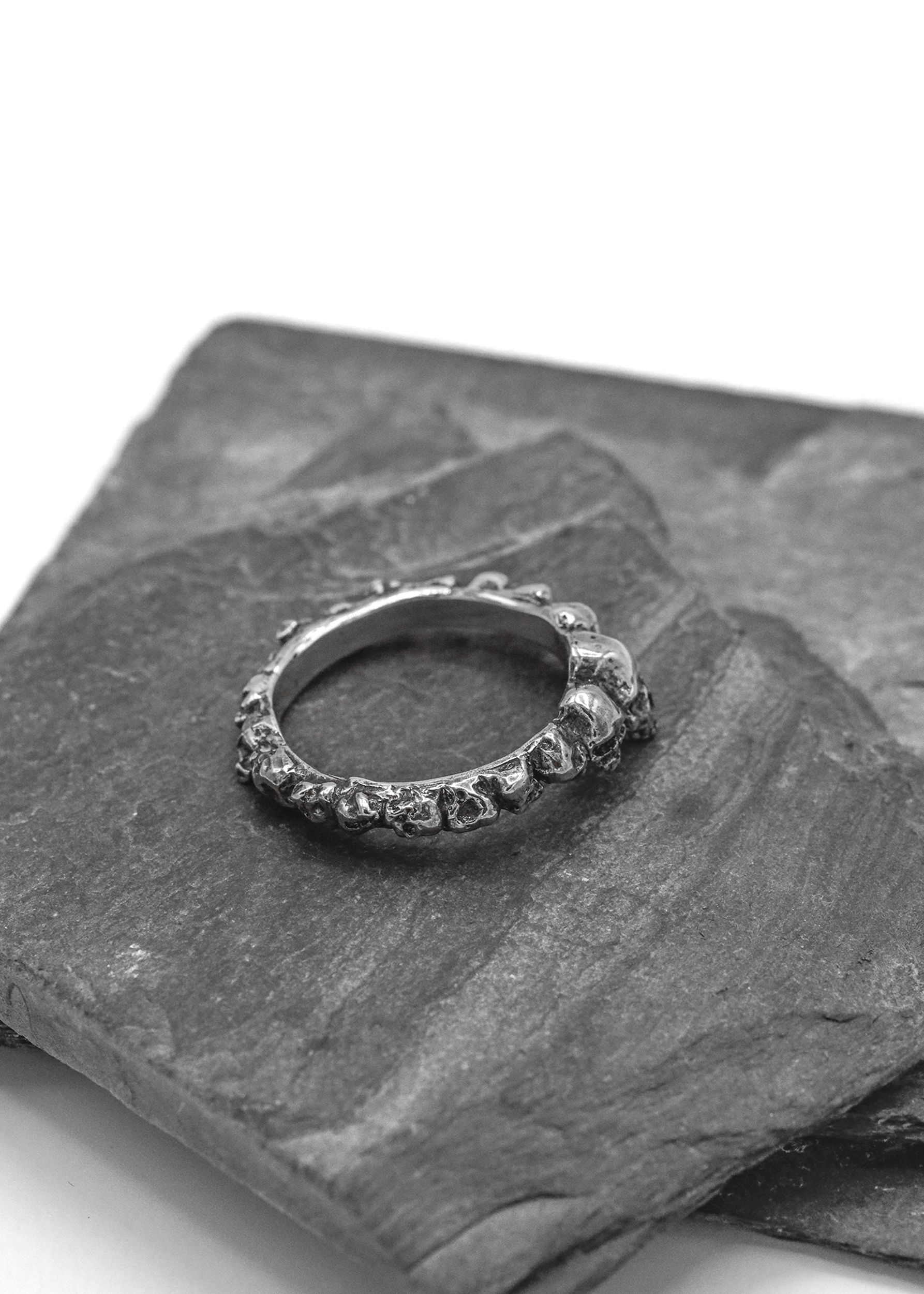 Nick Rule sterling silver band of skulls ring Bizarre Bazaar