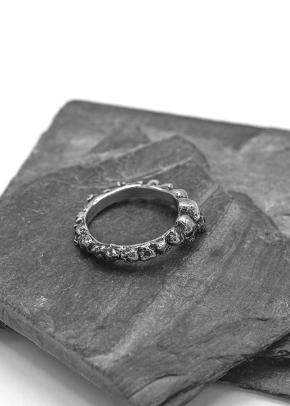 Nick Rule sterling silver band of skulls ring Bizarre Bazaar