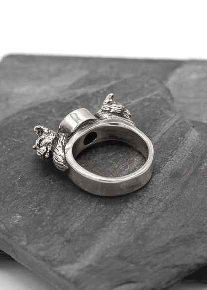 Nick Rule Double cat head ring with garnet Bizarre Bazaar