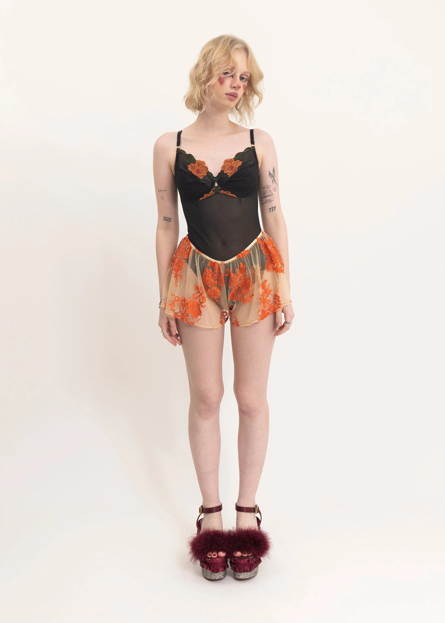 Bizarre Bazaar Floral embroidered mesh bodysuit