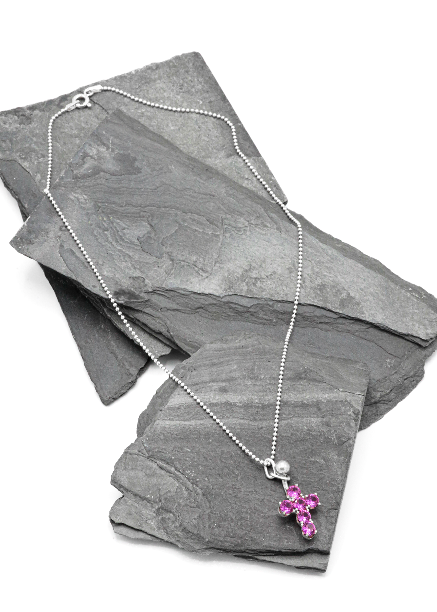 Kick in the Eye Praise Me cross pendant Bizarre Bazaar